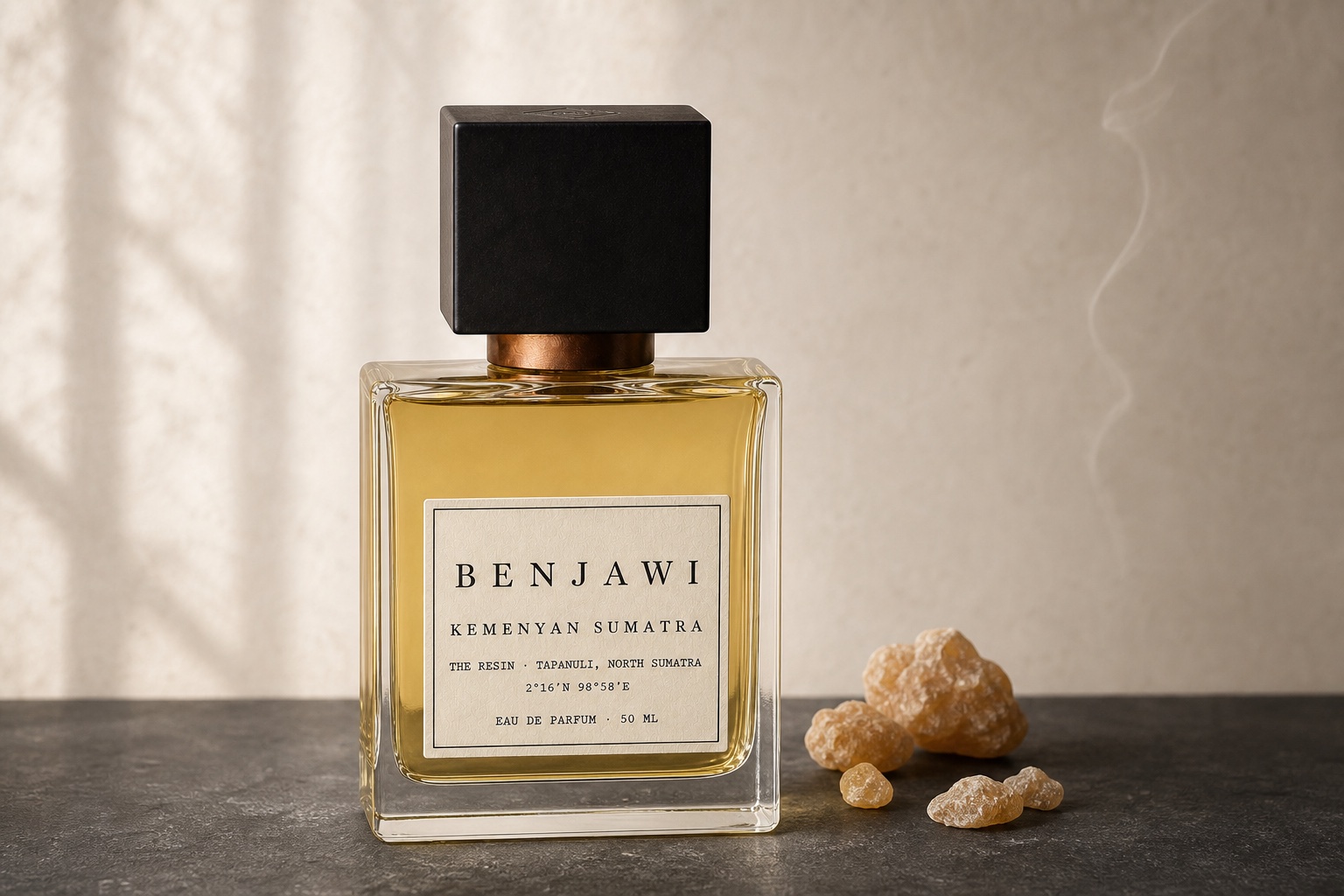Kemenyan Sumatra fragrance beside pale pieces of benzoin resin, with a line of incense smoke