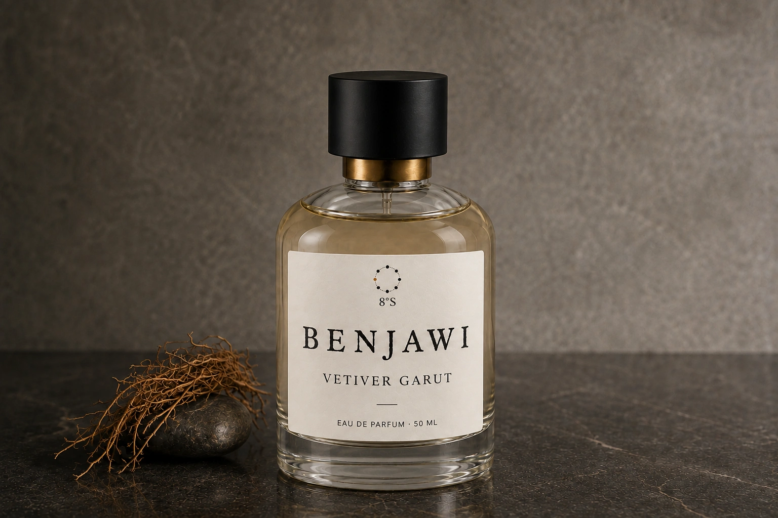 Round Vetiver Garut fragrance bottle beside fine roots and a river stone